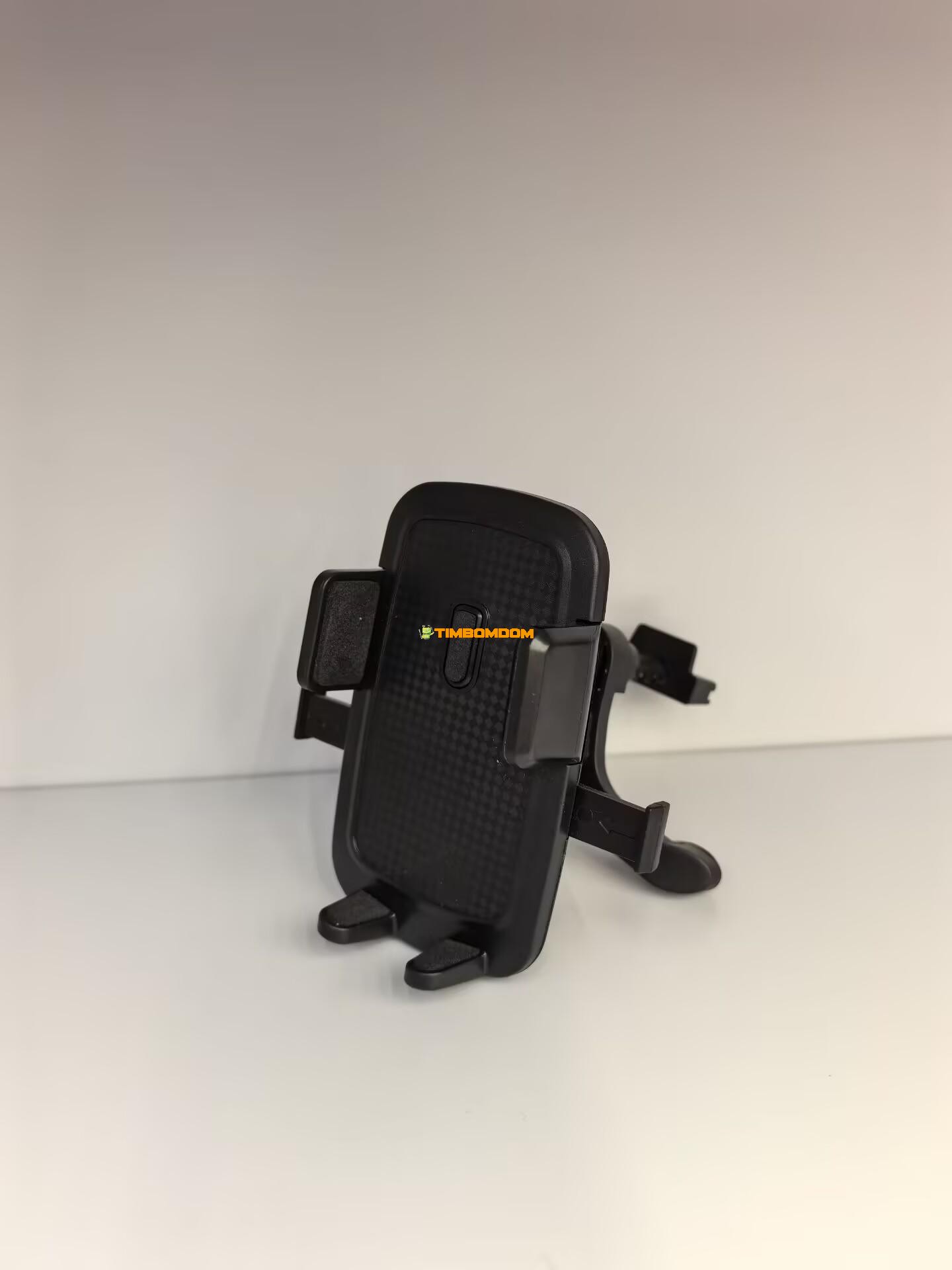Automatic tilt pattern plastic outlet phone holder Automatic tilt pattern plastic outlet phone holder