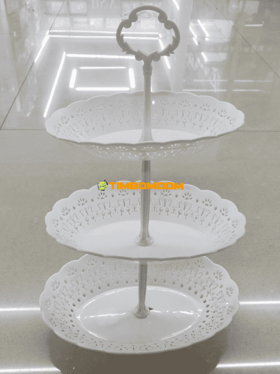 Three-tiered fruit plate with a stand Three-tiered fruit plate with a stand