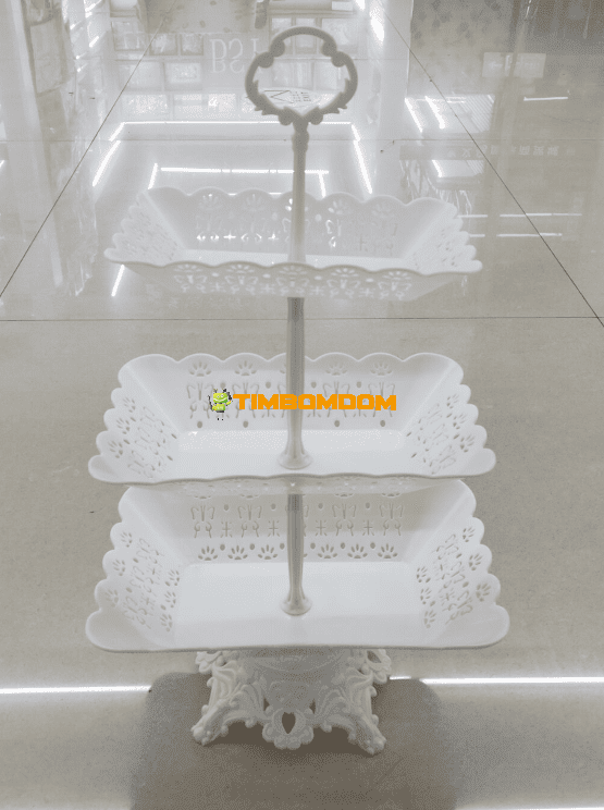 Three-tiered fruit plate with a stand Three-tiered fruit plate with a stand