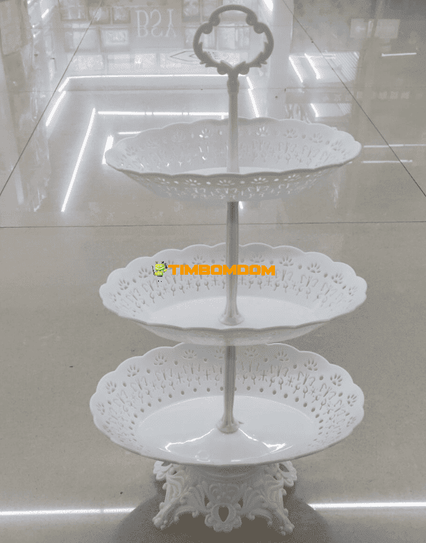 Three-tiered fruit plate with a stand Three-tiered fruit plate with a stand