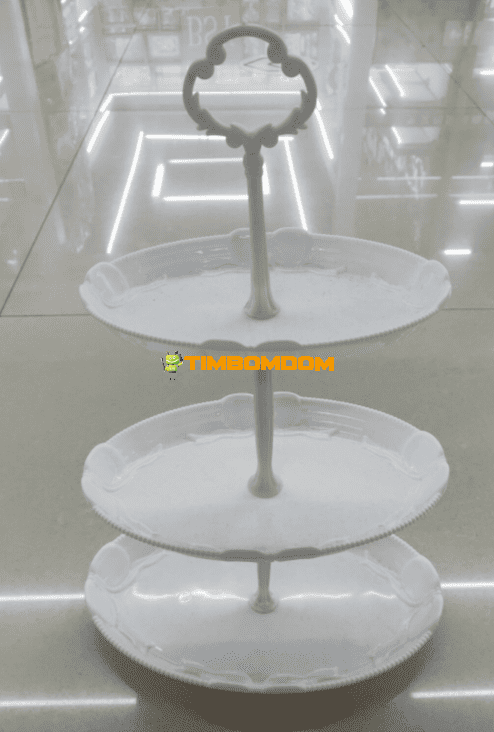 Three-tiered fruit plate with a stand Three-tiered fruit plate with a stand