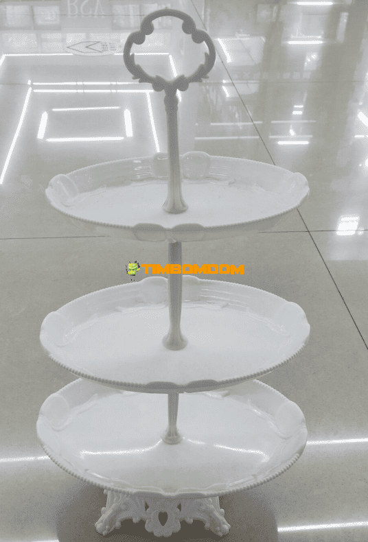 Three-tiered fruit plate with a stand Three-tiered fruit plate with a stand
