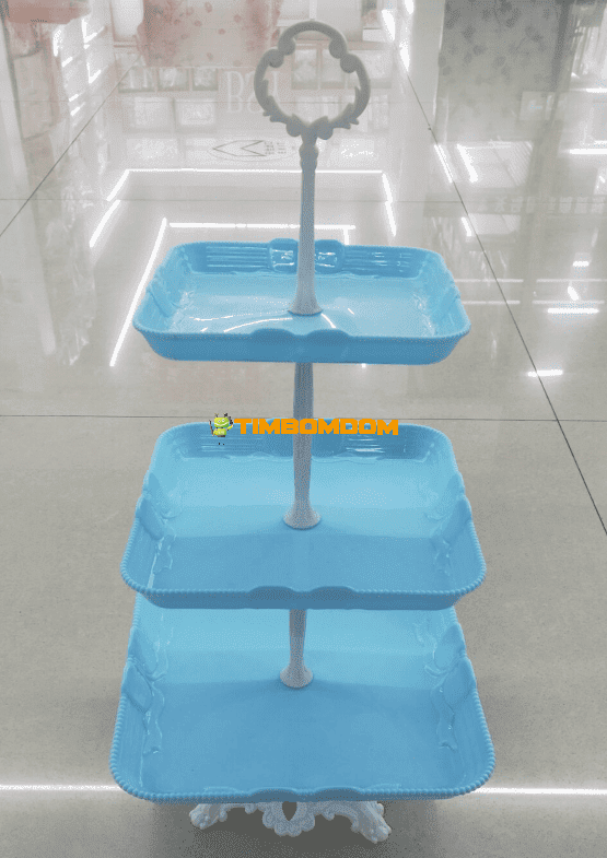 Three-tiered fruit plate with a stand Three-tiered fruit plate with a stand